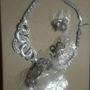 Necklace, ring, clip on earrings, braclet